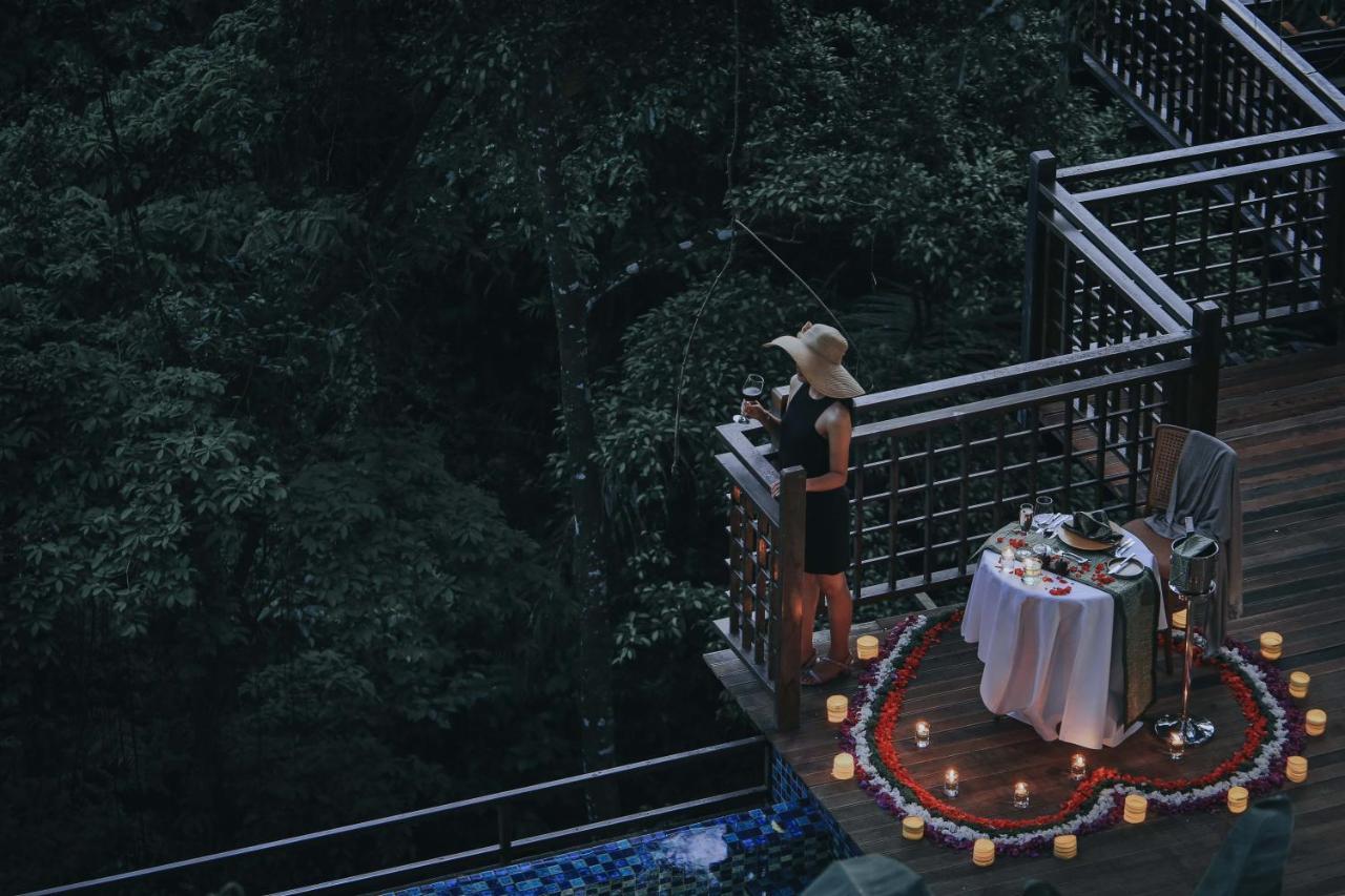 The Sebali Resort Ubud Zewnętrze zdjęcie A woman at a romantic dinner